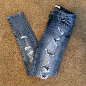 Distressed Mid-Rise KanCan Skinny Jeans